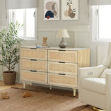 a light wood color dresser in a modern farmhouse living room set up, in the middle of an swivel accent chair and faux olive tree