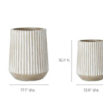 The magnesium oxide planters, featuring beige and white stripes, are available in two sizes: the weather-resistant larger planter stands 22.1 inches high with a 17.1-inch diameter, while the smaller option measures 16.1 inches high and has a 12.6-inch diameter.
