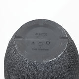 Bottom view of a gray, concrete-textured plastic planter featuring a Drill Hole Here marking and recycling symbols, designed to be UV and weather-resistant.