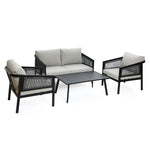 Outdoor conversation set with a black steel frame, featuring a two-seater sofa, two armchairs, and a rectangular coffee table. Cushions on the sofa and chairs are light gray.