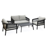 Outdoor conversation set with a black steel frame, featuring a two-seater sofa, two armchairs, and a rectangular coffee table. Cushions on the sofa and chairs are light gray.