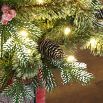 Warm-White-LED-Christmas-tree-with-realistic-looking-pine-cones-white-tips-and-faux-red-berries