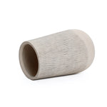 A textured, cylindrical tumbler with a natural wood pattern lies on its side against a plain white background, embodying a modern minimalist aesthetic.