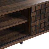 Close-up of a mid-century modern wooden cabinet with an open shelf and a door featuring a square textured pattern.