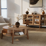 A cozy living room features the Miko coffee table by LuxenHome, with solid wood legs, showcasing a vase with branches and an open book. In the background, a mid-century wooden sideboard offers ample storage space. Soft sunlight filters through shutters, casting gentle shadows.