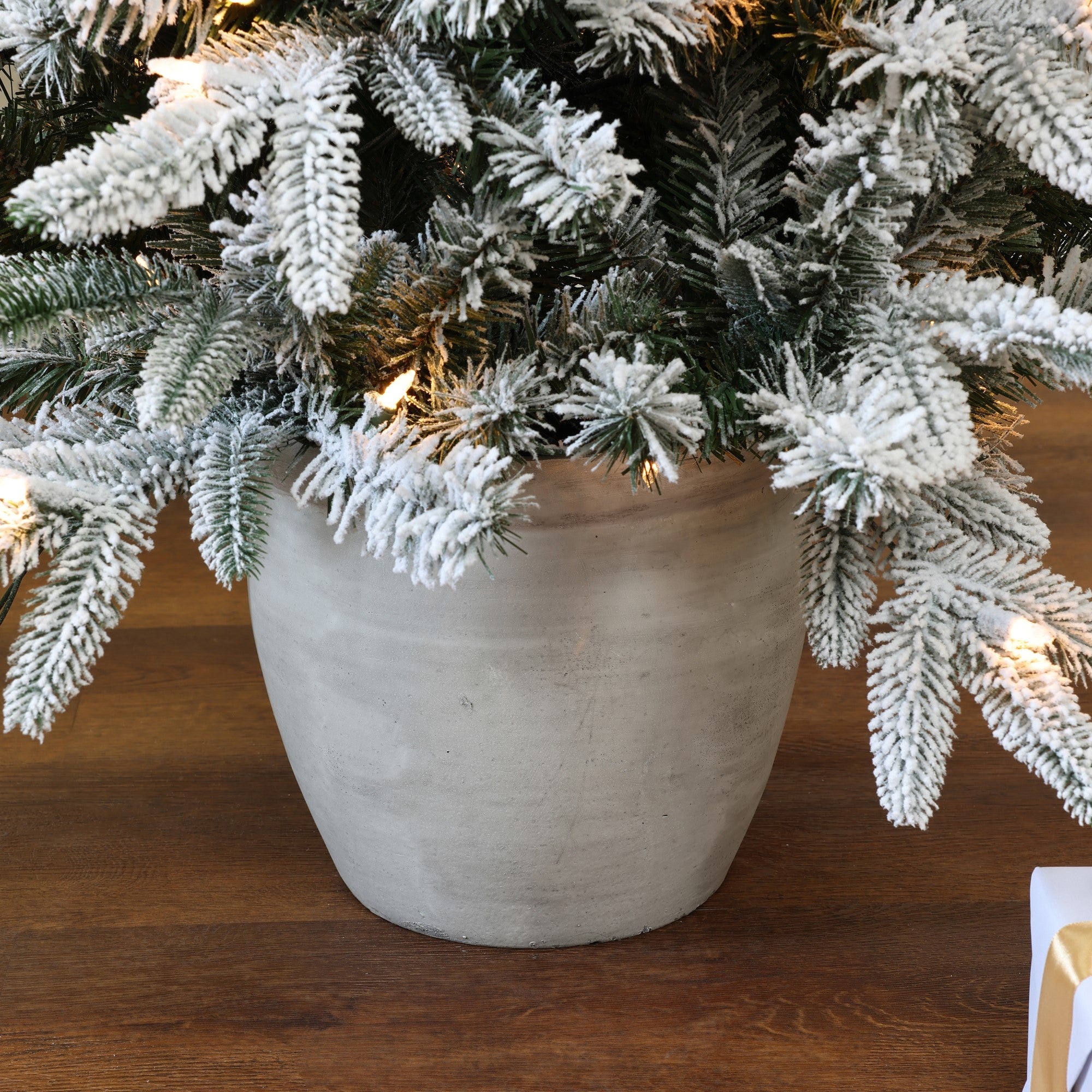 small-artificial-christmas-tree-with-modern-planter