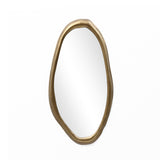 An elegant wall mirror with an irregularly shaped design features a smooth, gold-toned frame set against a plain white background.