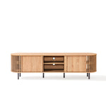 A mid-century modern TV cabinet with rounded corners, open shelving in the middle, and two side cabinets enhanced by vertical slats. It features a natural finish paired with sleek black metal legs, balancing style and functionality seamlessly.