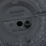 Close-up of a black plastic surface with the text GL8620B and Made in China, featuring a marked drill hole and recycling symbol, akin to the durable polyethylene planter material perfect for both indoor and outdoor use.