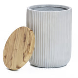 Fluted cement outdoor end table with faux wood top