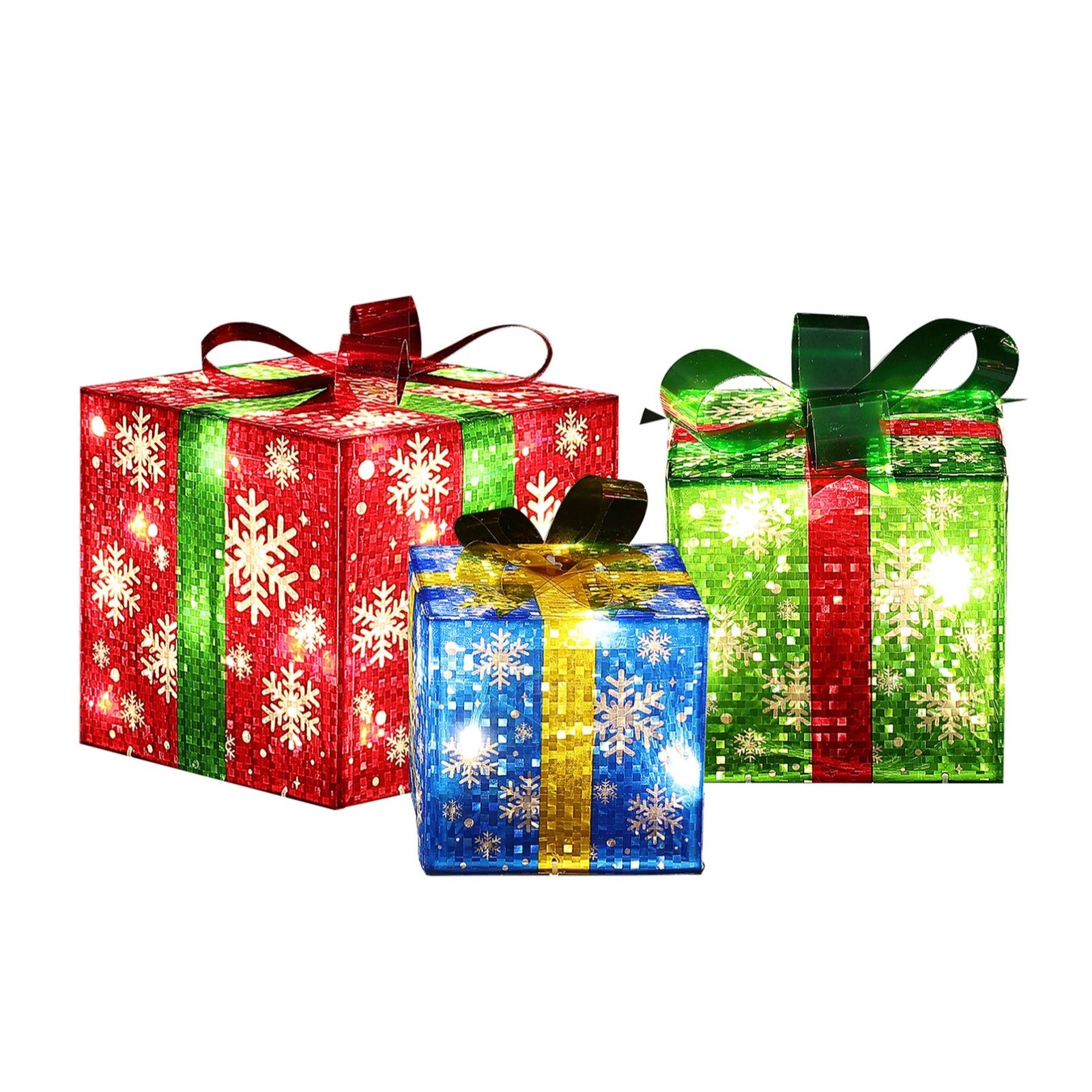 Three gift boxes with bows decorate with white snowflake patterns and are lit from within for the perfect LED gift boxes.