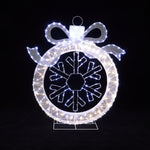 Illuminated holiday decor piece shaped like an ornament with bow snowflake, resembling a lighted ornament wreath.