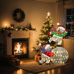 Warmly lit living room with christmas tree, fireplace, wrapped gifts, featuring illuminated snowman holiday decor.