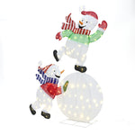 2 pre-lit snowman decor, one balancing on lit snowball ,the other supporting from below, wearing colorful scarves hats.