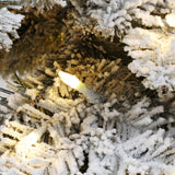 pre-lit-classic-artificial-tree-with-lifelike-snow-dusted-branch-tips