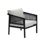 Modern armchair with a black steel frame, light gray cushions, and rope detailing on the sides. Perfect as part of an outdoor conversation set for stylish gatherings.