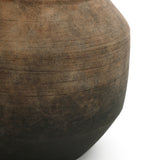 The Brown Ombre Terracotta Round Vase (13.2 h) by LuxenHome features a handcrafted, rustic design with textured horizontal lines and a matte finish, giving it a vintage aesthetic against a white background.