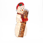 Light-up snowman outdoor holiday decoration wearing a red hat and scarf, holding a ruler-style LET IT SNOW sign. Perfect as yard holiday decor or a charming lighted display against a white background.