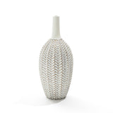 The LuxenHome Modern geometric pattern resin tall trumpet vase, 19.5 h, features a white ceramic finish with a narrow neck and decorative braided leaf-like design for a textured, intricate appearance. Its displayed against a plain white background.