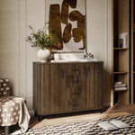 Mid-century sideboard cabinet with four drawers and two cabinets stands against a wall.