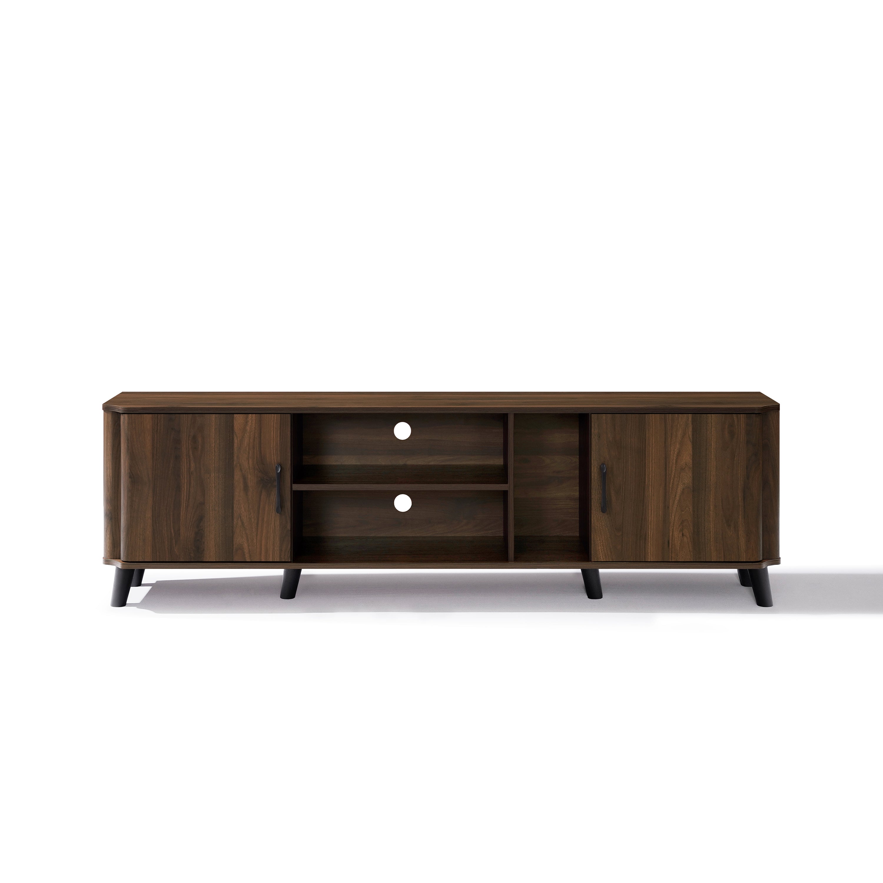 Wooden TV console cabinet with two closed cabinets on each side, two open shelves in the center, four short black legs.