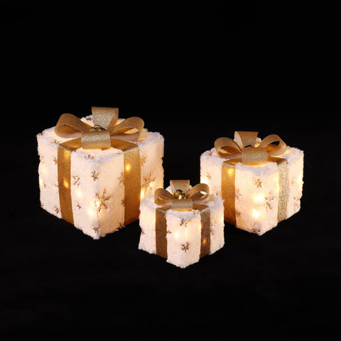 Lightened-snowflake-design-white-and-gold-set-of-three-giftboxes-decor