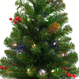 Mini-Christmas-tree-with-pine-branches-red-berries-pinecones-and-multi-colored-led-lights