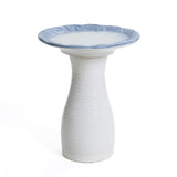 White ribbed ceramic bird bath