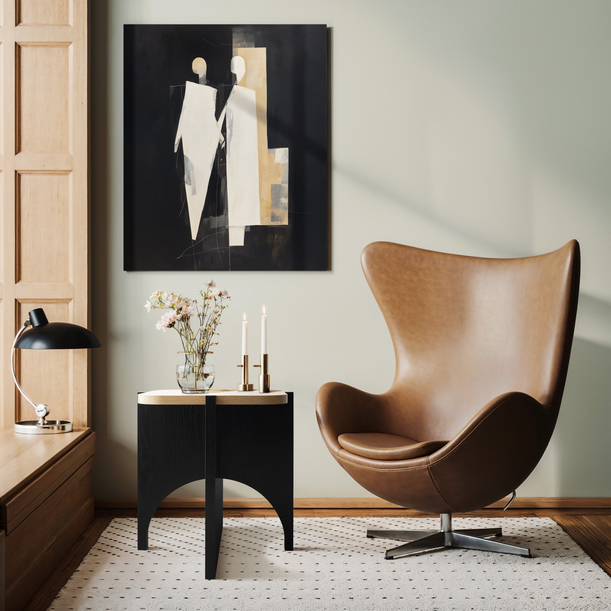 A cozy room showcases a tan egg chair beside the Bernard black and light wood finish end/side table by LuxenHome, adorned with flowers, candles, and a lamp. A modern abstract painting with geometric figures enhances the light green wall as natural light highlights the rooms modern design.