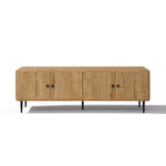 Rectangular wooden piece features four cabinet doors with black round handles and sturdy black metal legs.