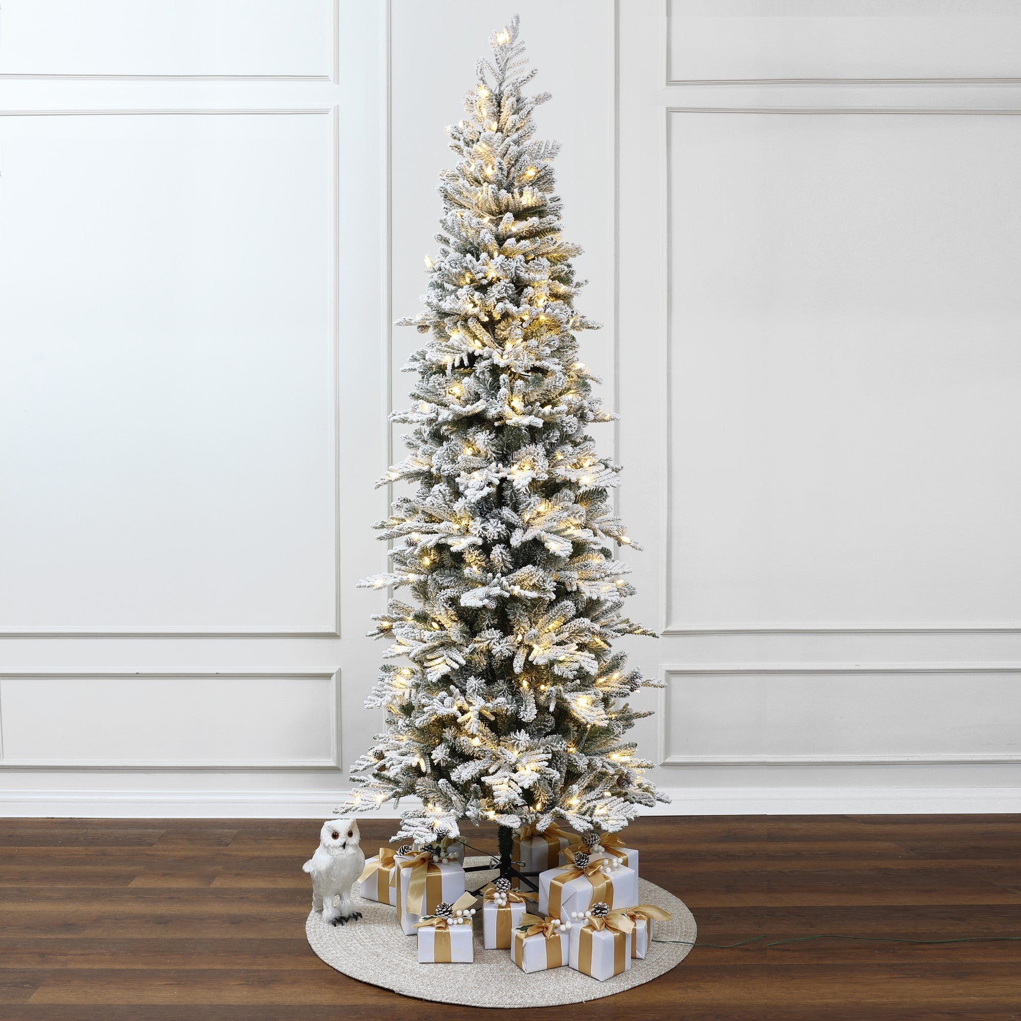 create-a-winter-wonderland-indoors-with-this-slim-pre-lit-snow-flocked-christmas-tree