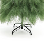 5ft artificial tree with feathery branches, supported by black metal stand on white background.
