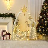 Pre-lit nativity scene decor featuring Mary, Joseph, baby Jesus stands beside a  tree ,presents near fireplace.