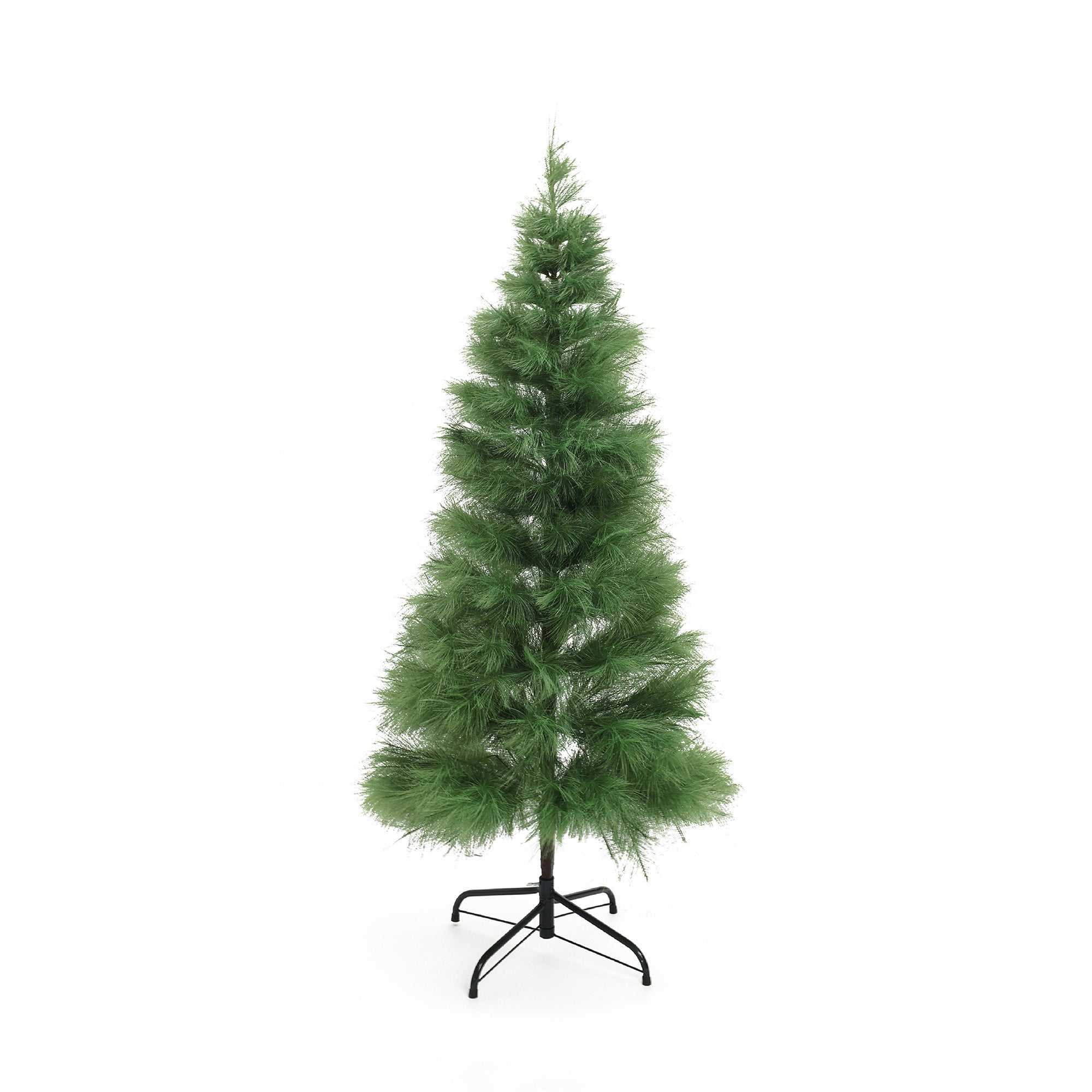 Slim artificial christmas tree with sparse branches stands on black metal stand against plain white background.