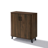 Dark sideboard cabinet with two doors, black handles, tapered black legs offers stylish storage.