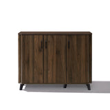Mid-century walnut wood sideboard cabinet with three doors, black handles, four short black legs.