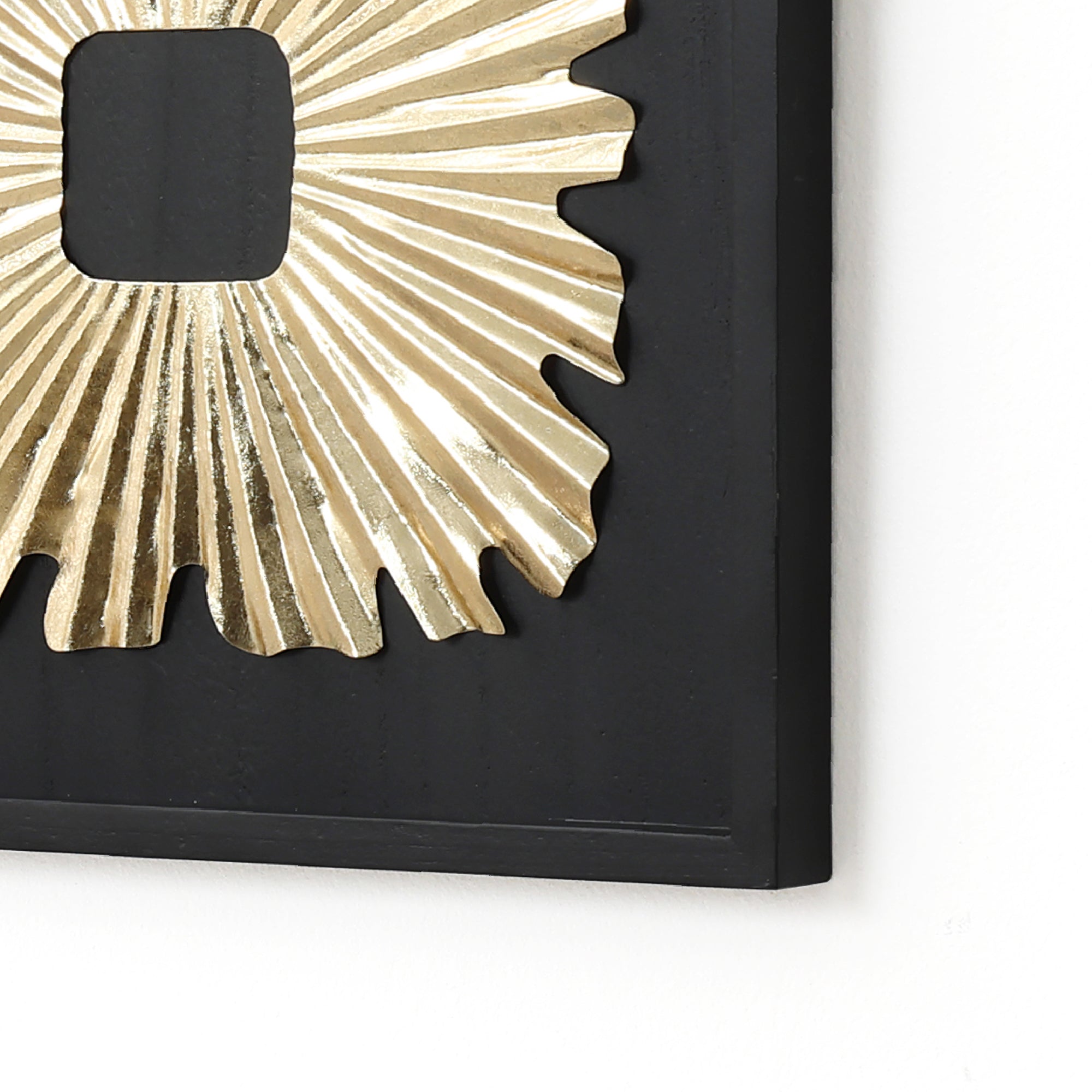 Close-up of modern wall decor radiating across a black rectangular background for a striking abstract metal wall art effect.