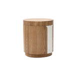 Round wooden side table with a partial textured white accent on one side, set against a white background.