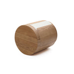 Cylindrical wood object with modern elegance features a light-colored textured strip across its surface.