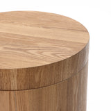 Close-up of a wood storage side table with a smooth, light oak finish, exuding modern elegance.
