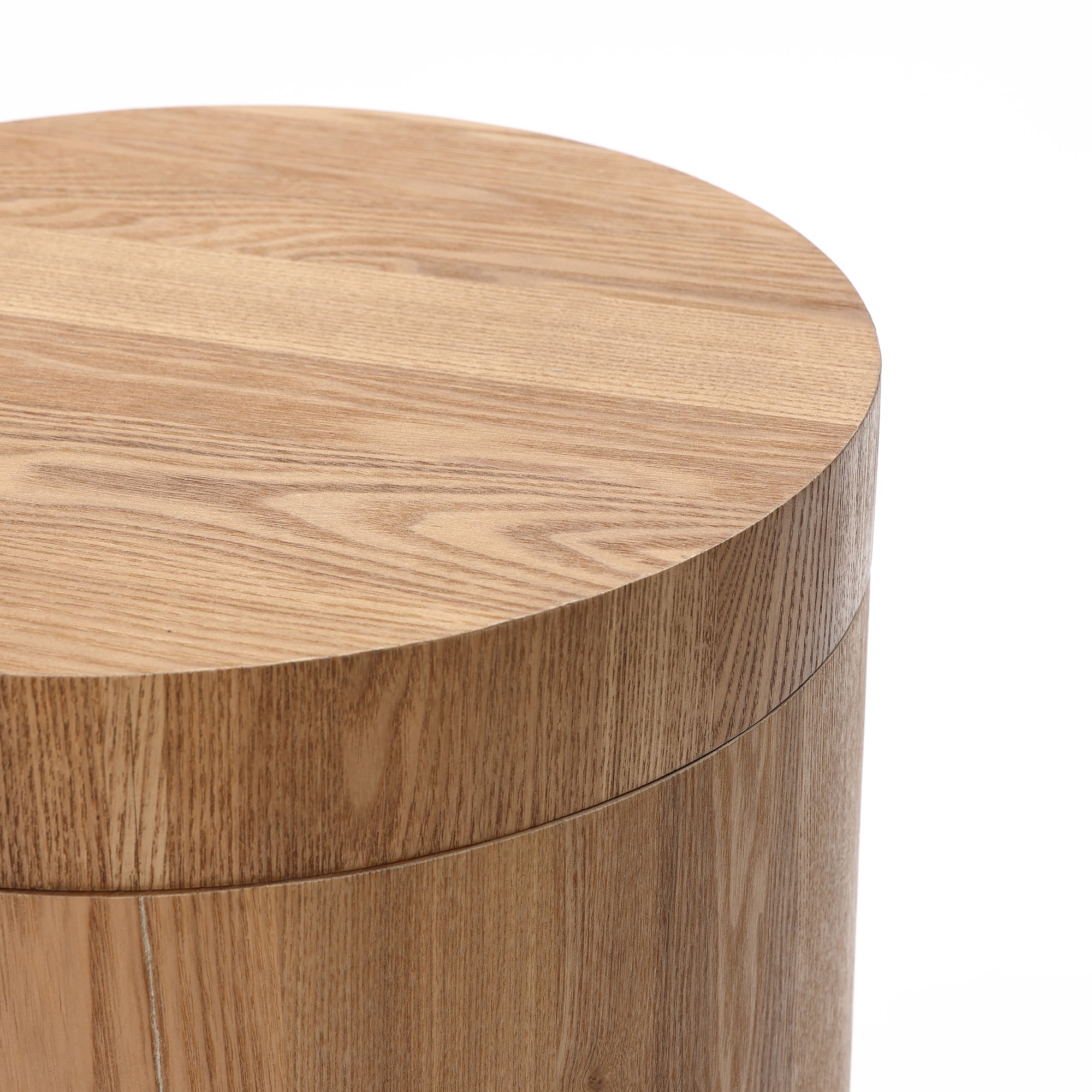 Close-up of a wood storage side table with a smooth, light oak finish, exuding modern elegance.