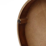 wood storage side table, showing a small rectangular block attached with a dark circular pad.