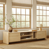 Minimalist wooden TV console cabinet placed in front of large windows with beige blinds.