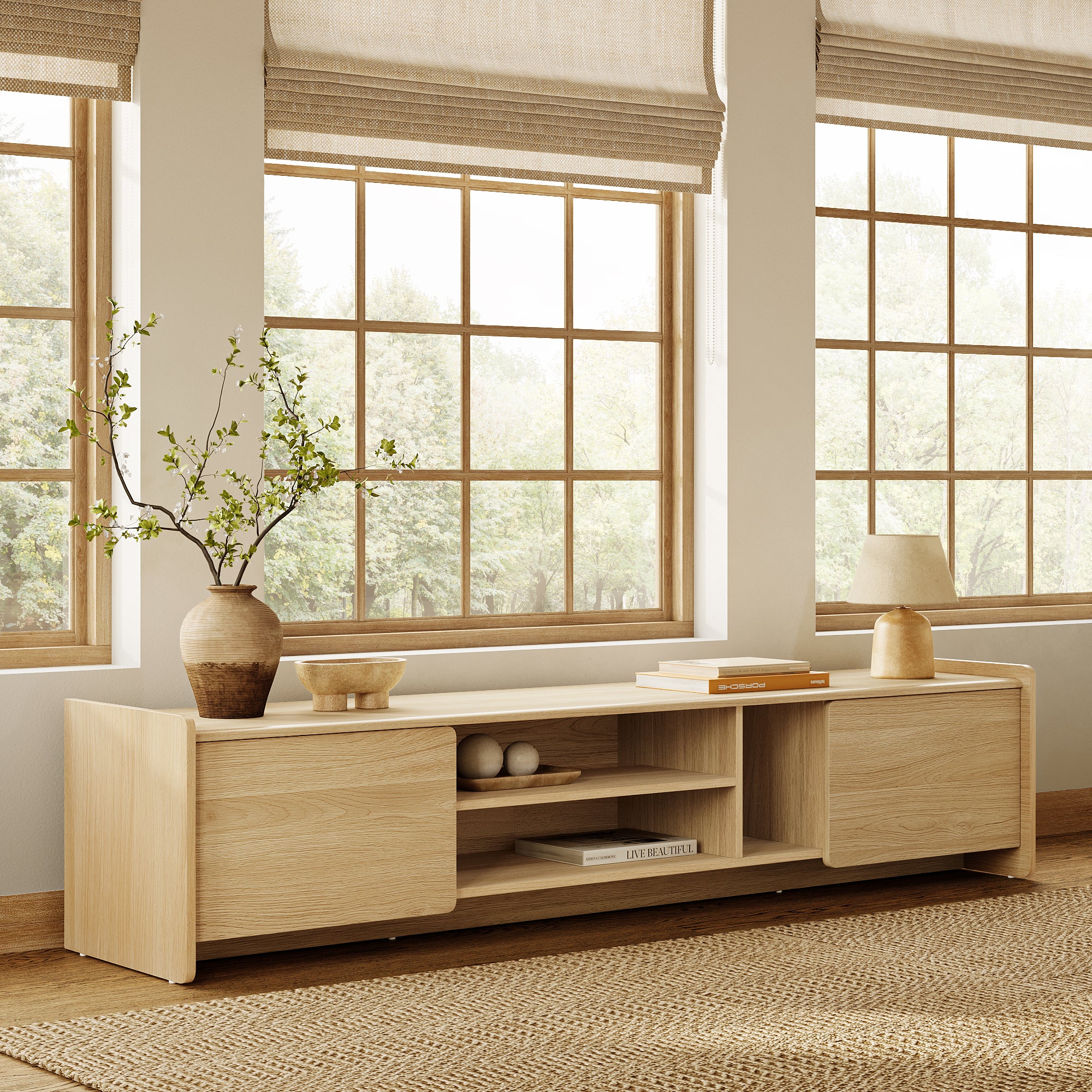 Minimalist wooden TV console cabinet placed in front of large windows with beige blinds.