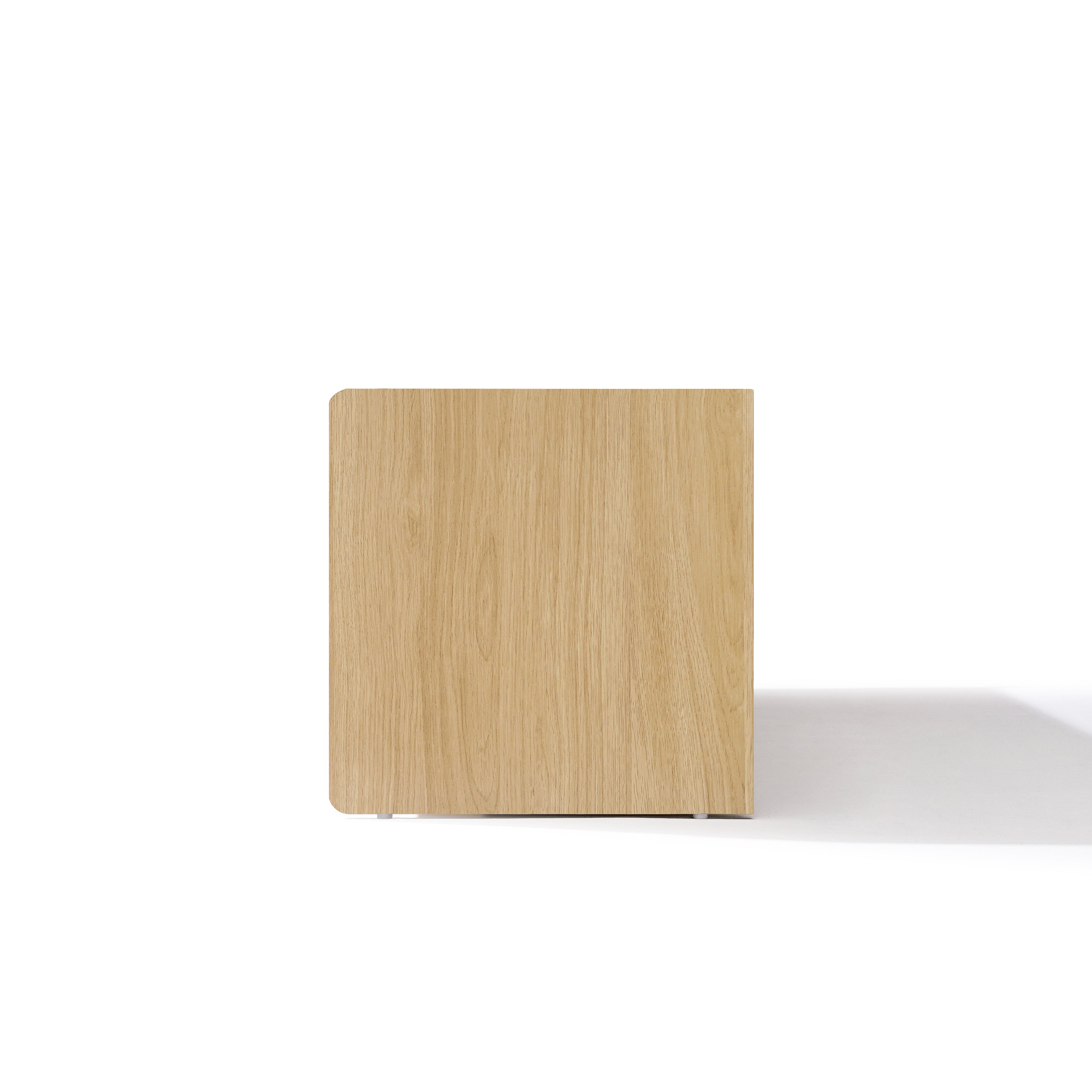 Rectangular TV console cabinet with a smooth, light oak finish, viewed from the side.