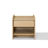 A light oak wood nightstand with a single drawer and an open lower shelf, Scandinavian-Japanese nightstand.
