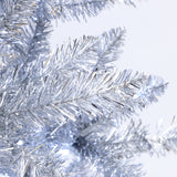Close-up of artificial silver tinsel branches from Silver Christmas Tree, resembling a pine tree, with plain light background.