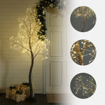 Birch artificial tree with warm white lights stands near wrapped gifts,white door, close-up insets highlight the tree’s detaile.