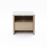Modern end table in snow oak finish features one open shelf and a closed drawer for storage.