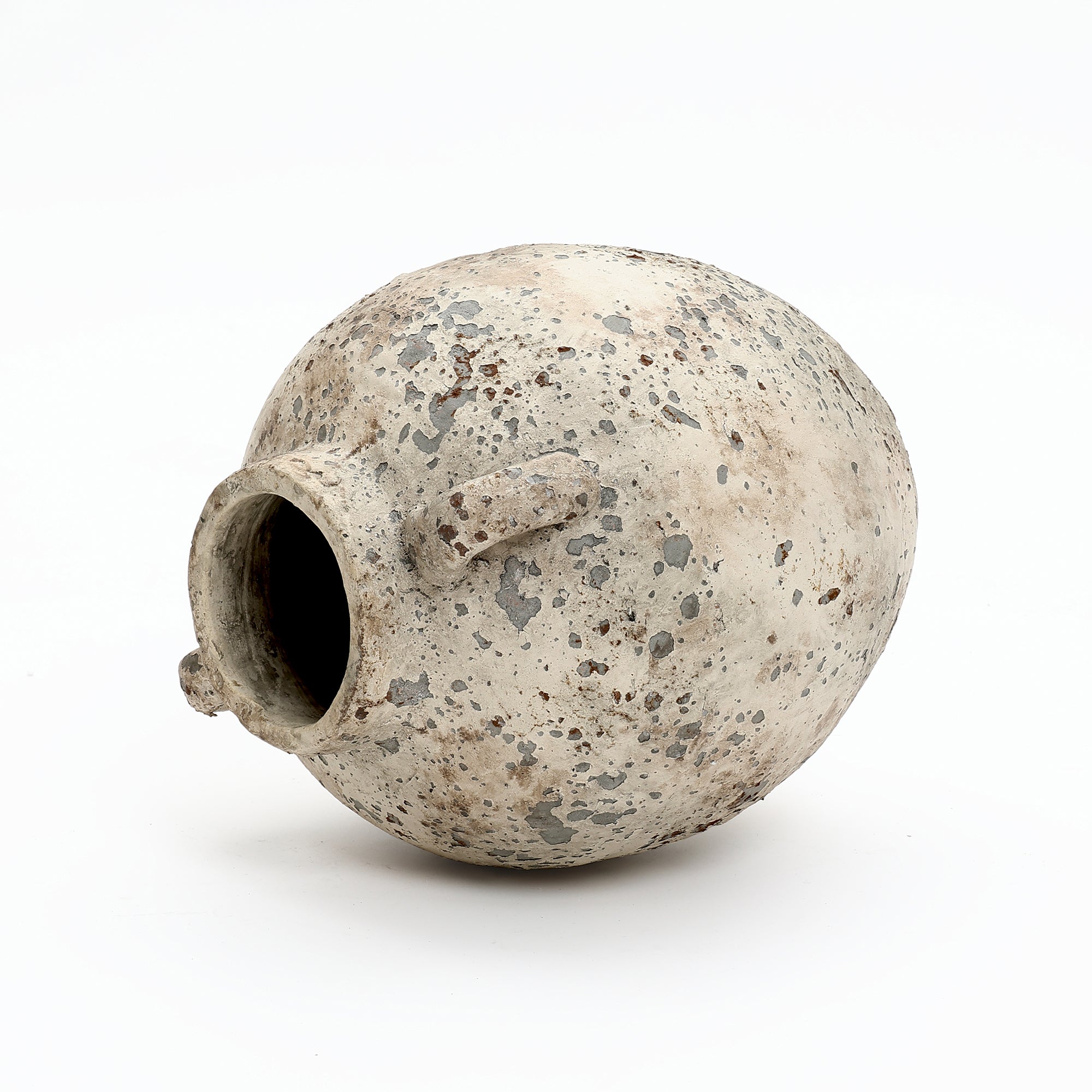 A weathered Terracotta Vase with a wide opening and small handles, displayed on its side against a white background—ideal for rustic farmhouse home décor.